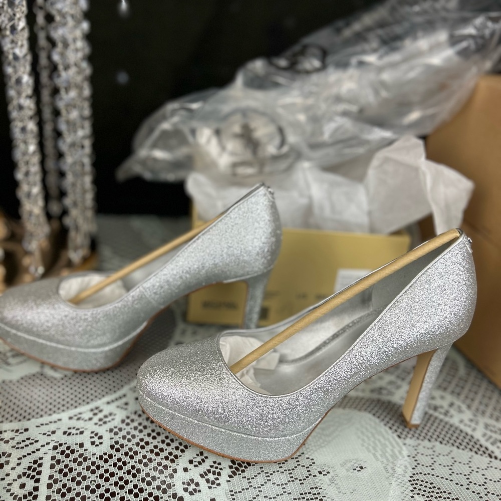 Michael Kors Silver high heel pumps. Size 8. Brand New in box